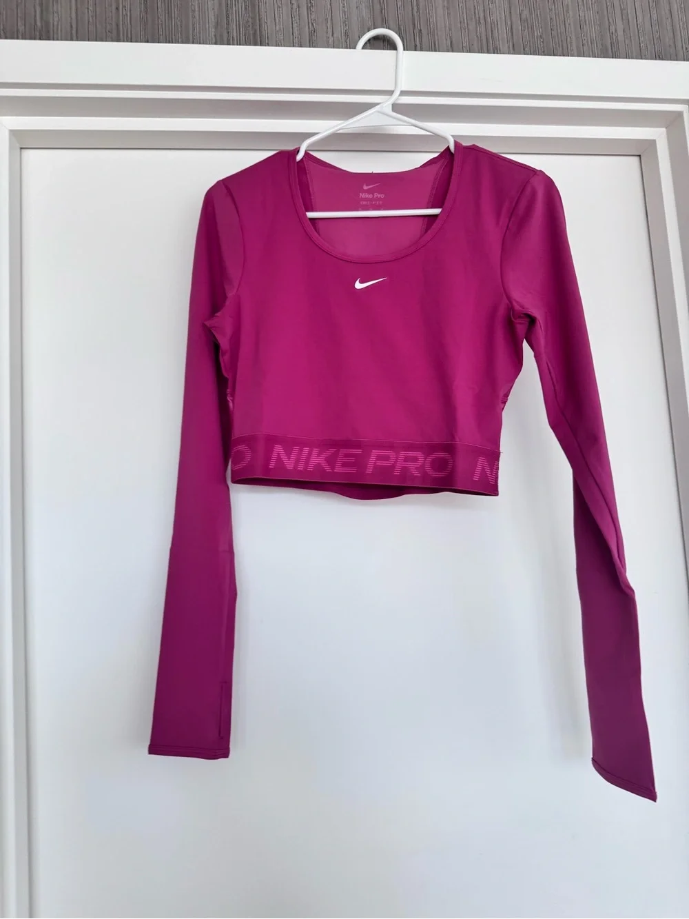 NWT Nike pro women’s long sleeve dri fit cropped workout training top size M